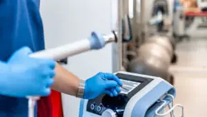 DOCTOR WITH SHOCKWAVE THERAPY MACHINE-3