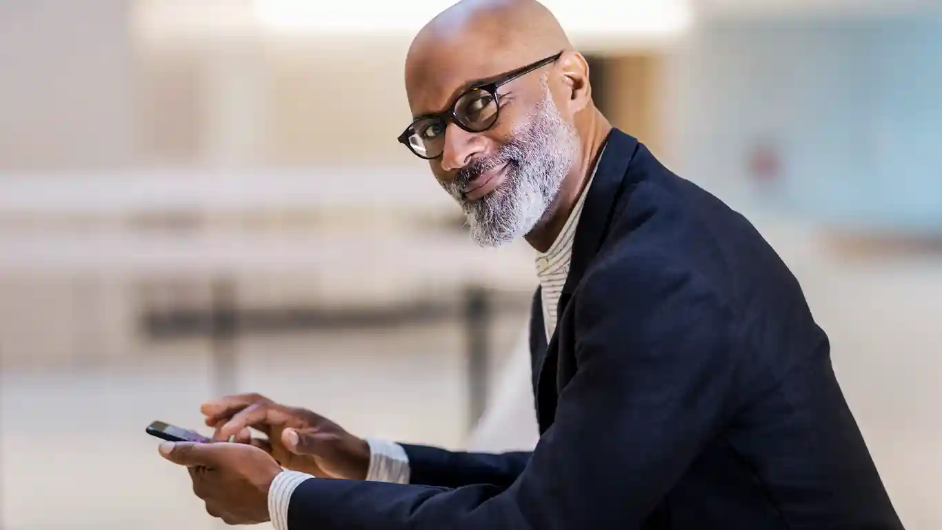 African American Male with Cell Phone