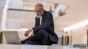 AFRICAN AMERICAN MALE AT LAPTOP