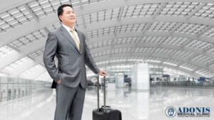 ASIAN MAN AT AIRPORT